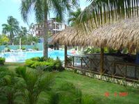 Pool and bar of the Hotel LAS PALMERAS RESIDENCE - Boca Chica - Dominican Republic